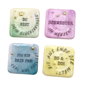 Kleine Fliese mit Glücksmotiv sort.