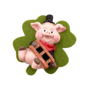 Schwein mit Leiter auf Kleeblatt