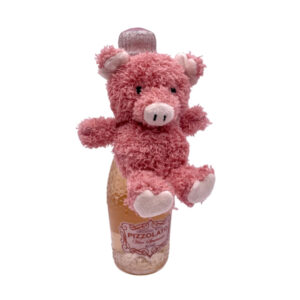 Glückssekt mit flauschigem Plüschschweinchen